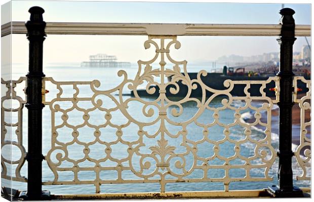 Brighton through the Victorian fence at the Pier Canvas Print by Chris Chung