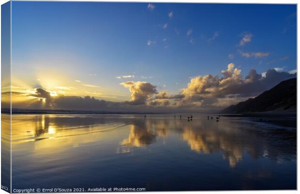 Sunset reflections on Baylys Beach Canvas Print by Errol D'Souza