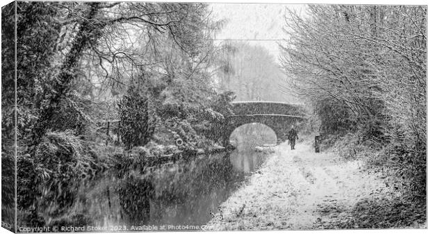 Snow On The Canal Canvas Print by Richard Stoker