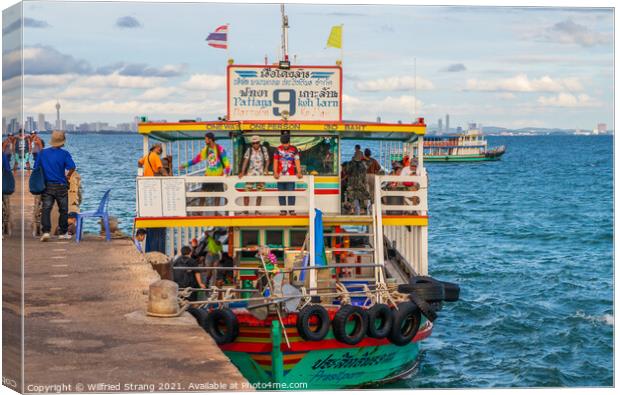 a ferry boat at the Pier of the Thai Island Koh Larn Thailand Asia Canvas Print by Wilfried Strang
