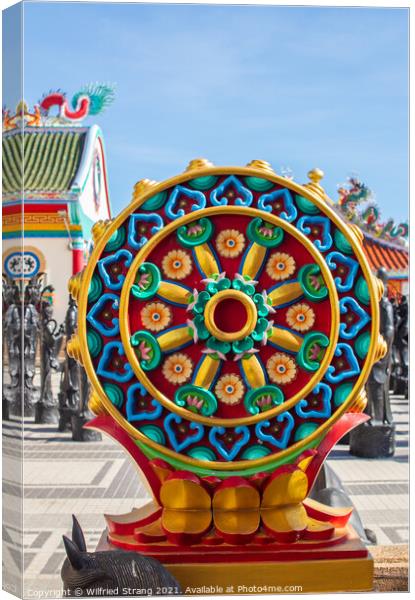 the Buddhist Dharma wheel known as that Wheel of teaching Canvas Print by Wilfried Strang