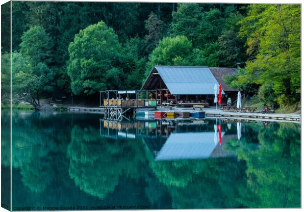 Beautiful scenery, peaceful lake of Lake Fusine Ba Canvas Print by Maggie Bajada