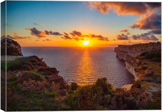 Picturesque Sunset with surrounding cliffs of the  Canvas Print by Maggie Bajada
