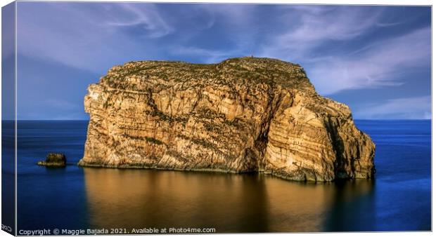 Reflection of Rock Formation surronded with blue s Canvas Print by Maggie Bajada