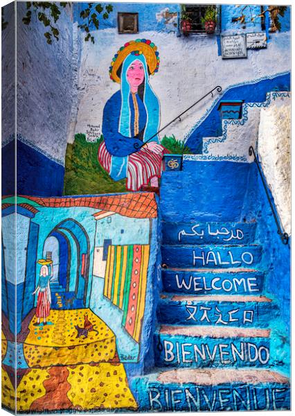 Colorful Graffiti on Moroccan houses in Morocco. Canvas Print by Maggie Bajada