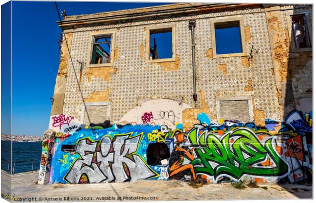 Almada Graffiti on Abandoned WareHouse Canvas Print by Antonio Ribeiro