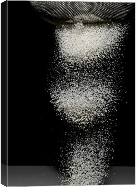 Sifting Flour on Black Background Canvas Print by Antonio Ribeiro
