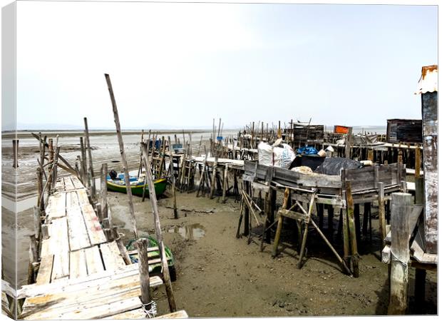 Carrasqueira Palafitic Pier during Low Tide Canvas Print by Antonio Ribeiro
