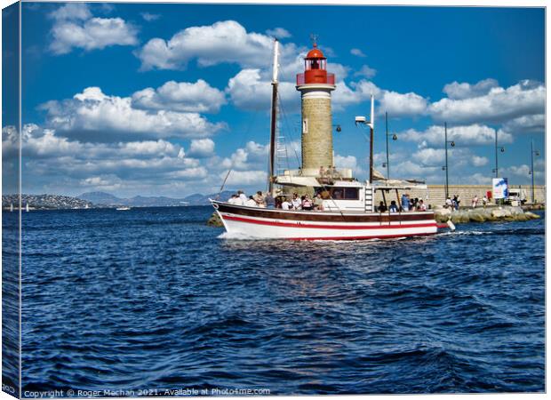 Sailing out of St Tropez Canvas Print by Roger Mechan