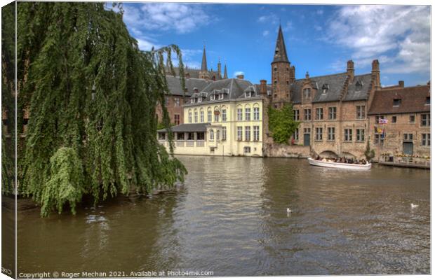 Castle Reflection on Bruges Canal Canvas Print by Roger Mechan