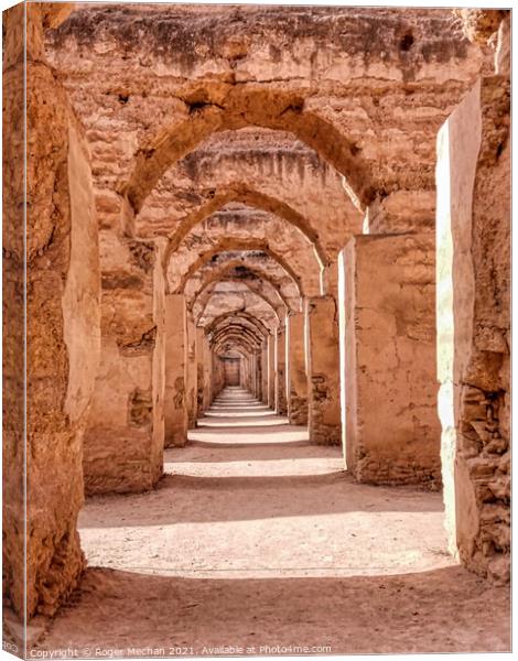 Arches of Red Walls Canvas Print by Roger Mechan