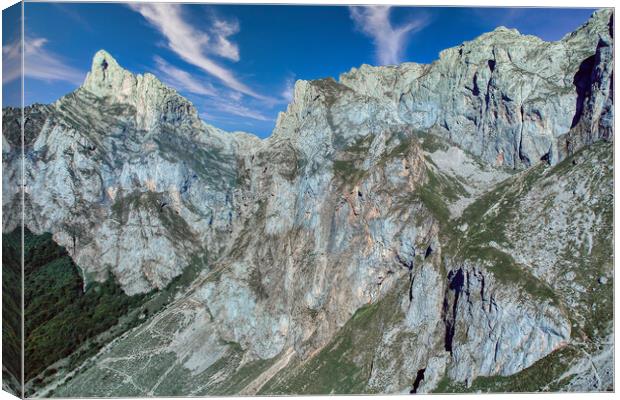 Conquering the Picos Mountains Canvas Print by Roger Mechan