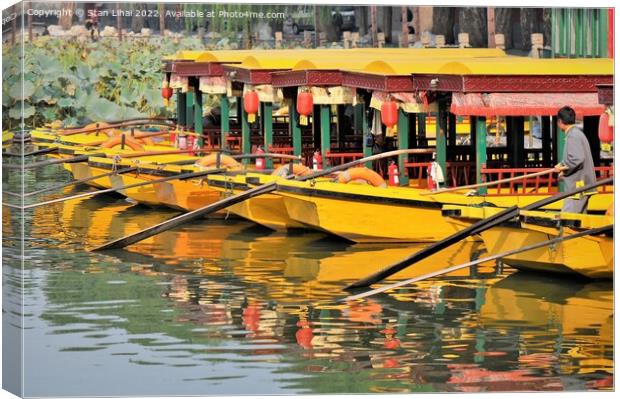 Yellow boats in Beijing park Canvas Print by Stan Lihai