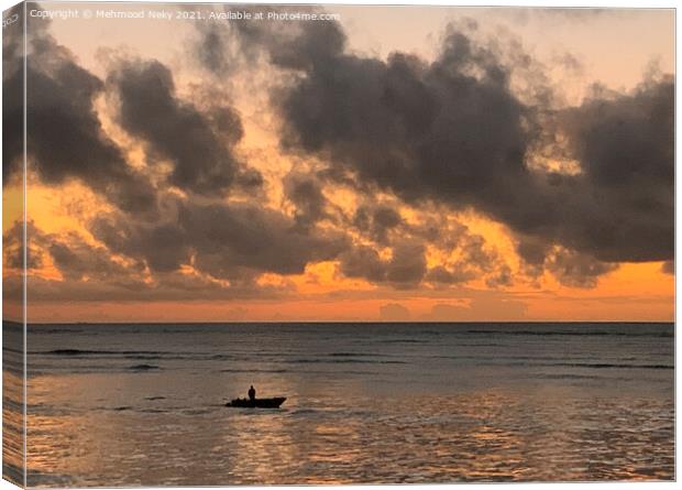 Cloudy sunrise and fisherman Canvas Print by Mehmood Neky