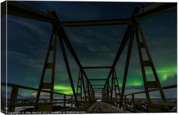 Northern lights bridge Iceland Canvas Print by Giles Rocholl