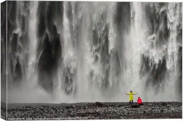 Skogafoss waterfall and tourists Iceland Canvas Print by Giles Rocholl
