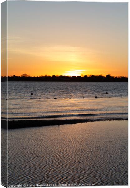 Sunset over the Colne estuary at Brightlingsea Canvas Print by Elaine Hayward