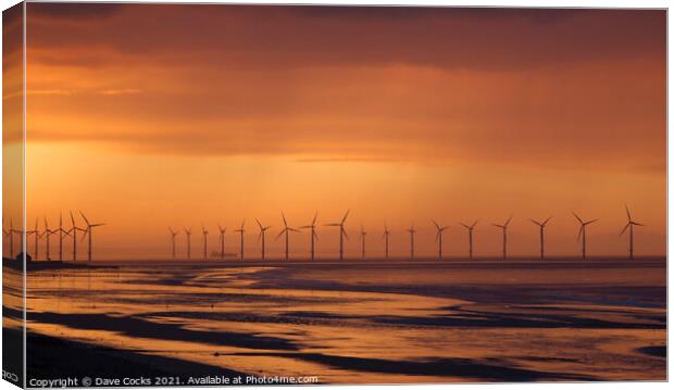 A sunset over the Teesside wind farm Canvas Print by Dave Cocks