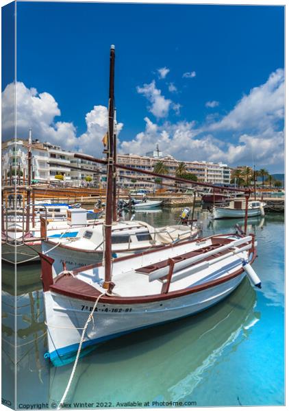Boats at harbour port of Cala Bona Canvas Print by Alex Winter