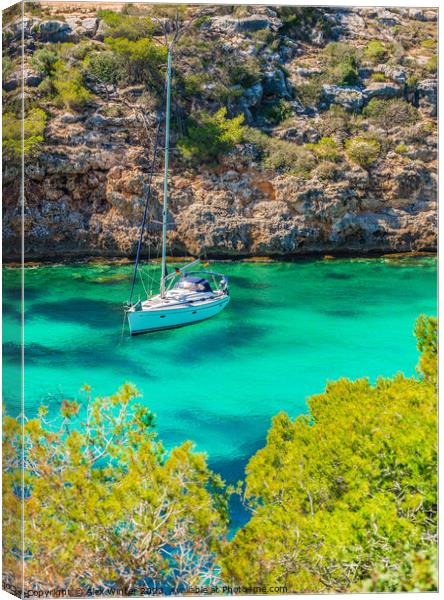 Beautiful bay with anchoring sailboat yacht Canvas Print by Alex Winter