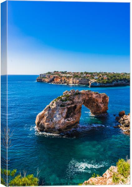 Rock arch at the coastline on Mallorca es pontas Canvas Print by Alex Winter