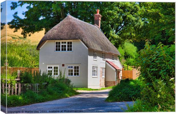 Idyllic Thatched Cottage in Dorset Canvas Print by Martin Day