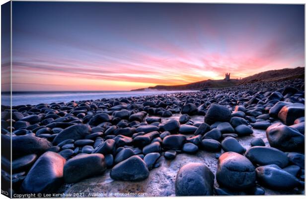 Dunstanburgh castle purple sunrise Canvas Print by Lee Kershaw