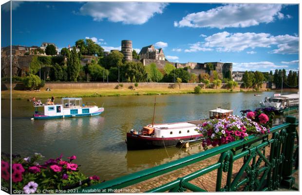 Angers, river traffic and Chateau d'Angers Canvas Print by Chris Rose