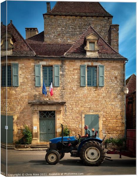 Domme, town Hall and tractor Canvas Print by Chris Rose