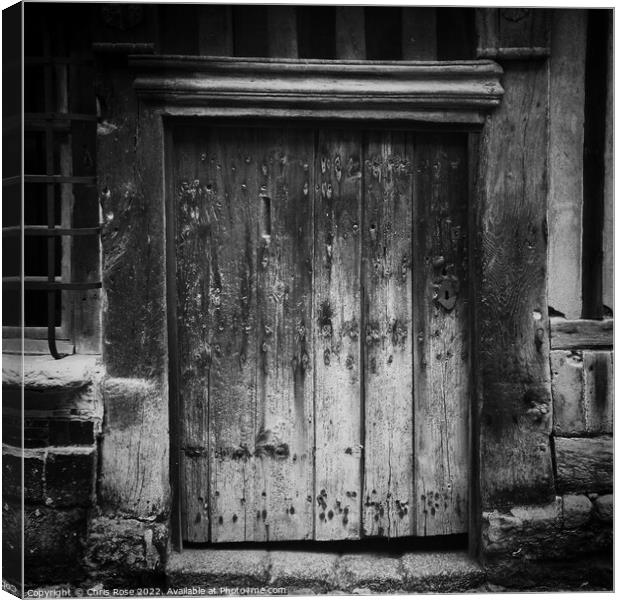 Weathered wooden door Canvas Print by Chris Rose