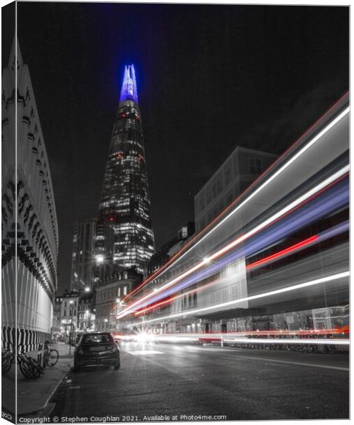 Colour Splash bus trail in front of The Shard Canvas Print by Stephen Coughlan