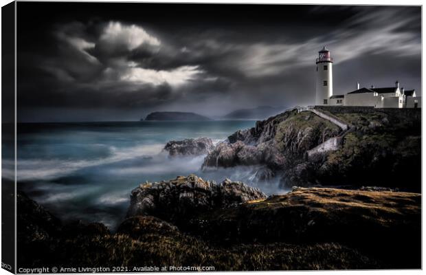 Dramatic Encounter of Storm and Lighthouse Canvas Print by Arnie Livingston