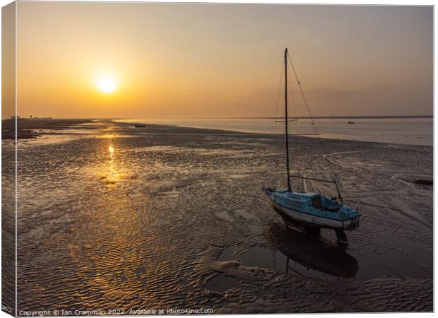 Yacht in the sunrise at Lytham Canvas Print by Ian Cramman