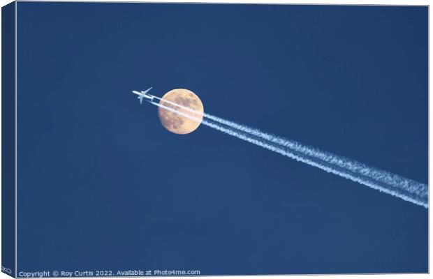 Moon Flypast Canvas Print by Roy Curtis