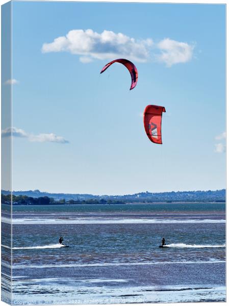 Kite Surfers Canvas Print by Jim Butler