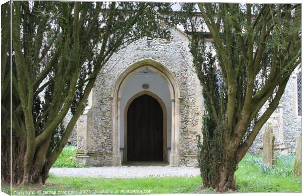 Church porch between trees Canvas Print by james craddock