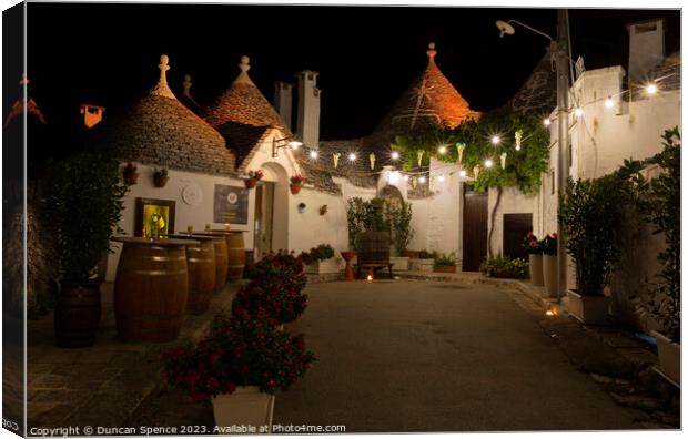 Trulli Houses Canvas Print by Duncan Spence