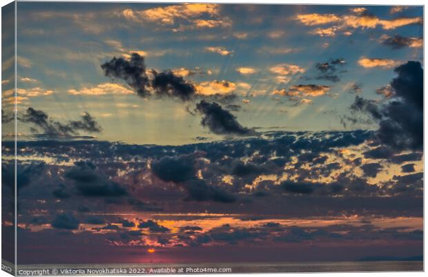 Sunset in the clouds Canvas Print by Viktoriia Novokhatska