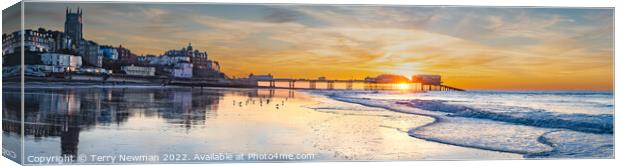 A Serene Sunset at Cromer Pier Canvas Print by Terry Newman