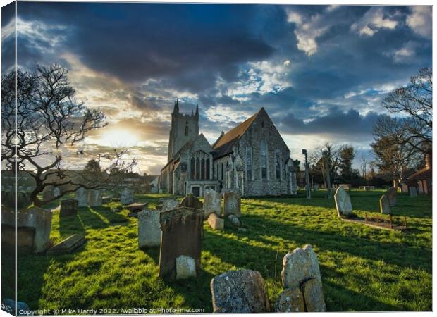 All Saints Magical and Moody church at Lydd Canvas Print by Mike Hardy