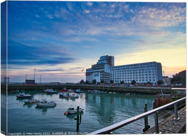 Hotel Burstin and Inner Folkestone Harbour at dusk Canvas Print by Mike Hardy