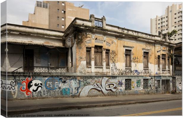 Graffiti on an old building in the heart of Sao Paulo, Brazil Canvas Print by Gordon Dixon