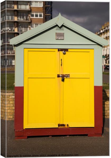 Yellow door of a beach hut on the esplanade, Brighton and Hove Canvas Print by Gordon Dixon