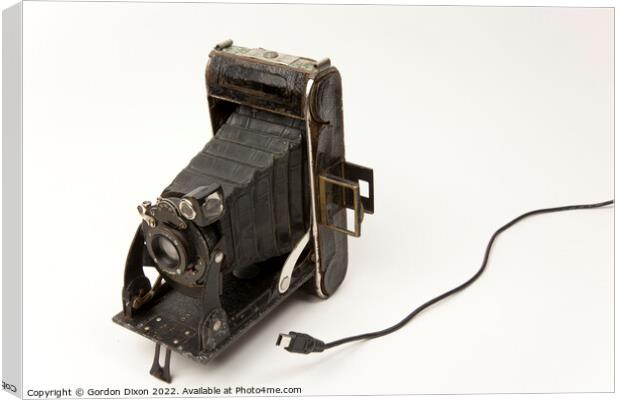 No USB connectivity in this antique bellows camera.  Canvas Print by Gordon Dixon