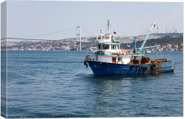 Fishing boat on the Bosphorus, Turkey Canvas Print by Gordon Dixon