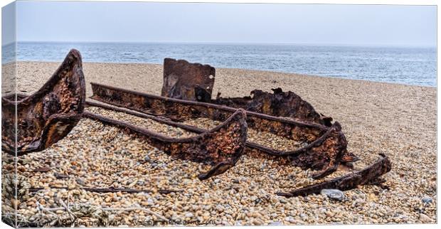 Rusting hull on Chesil beach - Dorset Canvas Print by Gordon Dixon