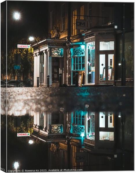 Puddle reflection of the lightened up Argyle Street in early rainy morning Bath Canvas Print by Rowena Ko