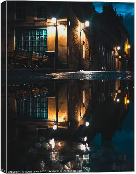 Puddle reflection of the lightened up York Street in early rainy morning Bath Canvas Print by Rowena Ko