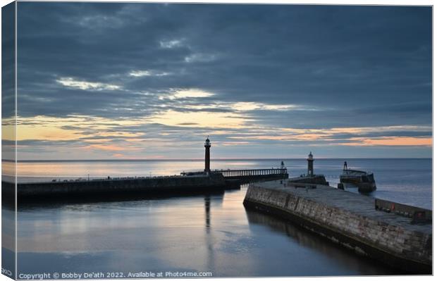 Whitby piers in the evening light Canvas Print by Bobby De'ath