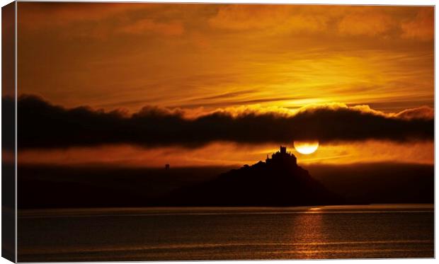 Sunrise  over St Michaels Mount Cornwall . Canvas Print by Anthony miners